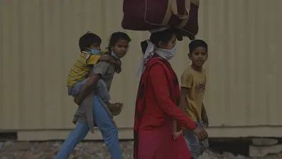 RIGHTS OF MIGRANT CHILDREN DURING COVID-19:A MINACIOUS REALITY
